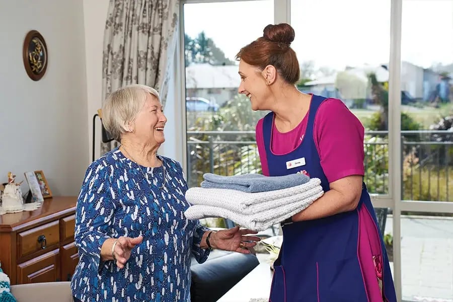 Assisted living resident with housekeeper