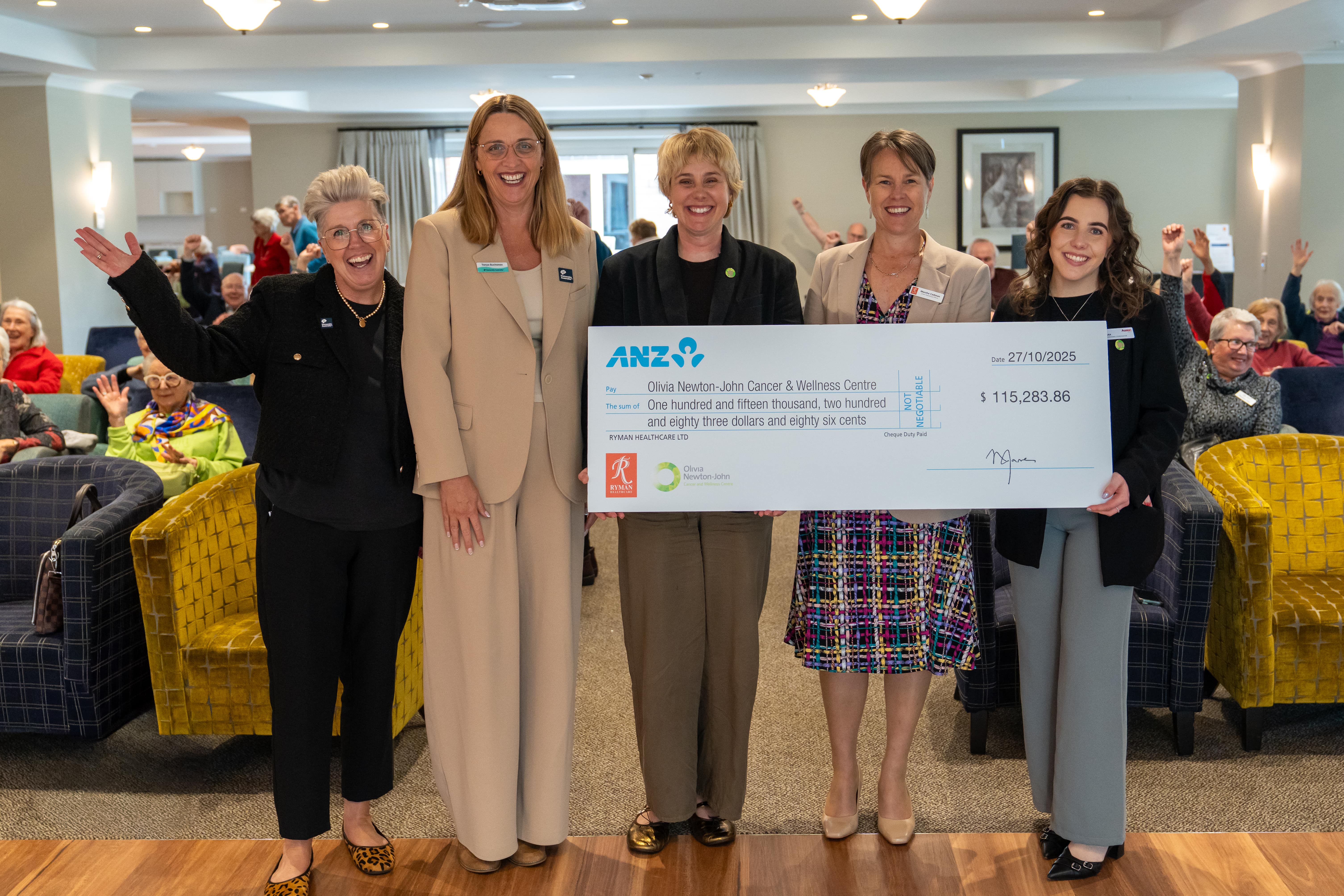 Charity Partner Announcement Cheque Group Photo