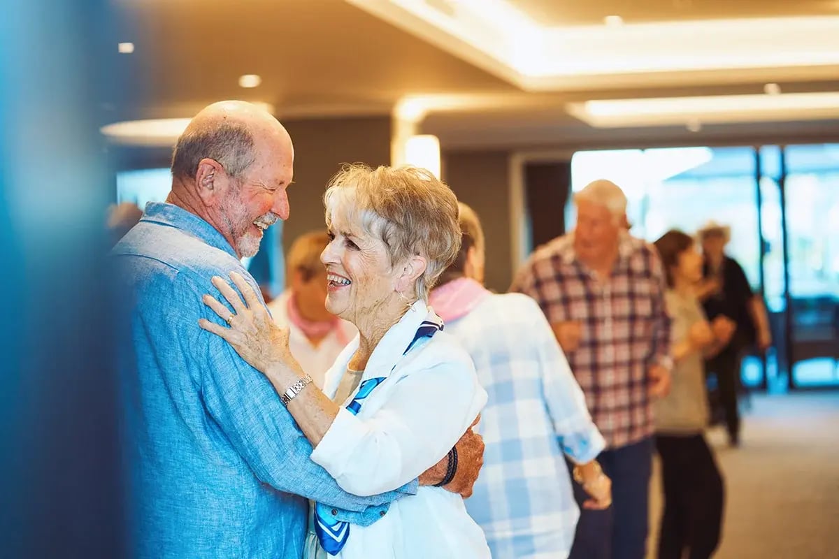 Residents dancing in a Ryman retirement village