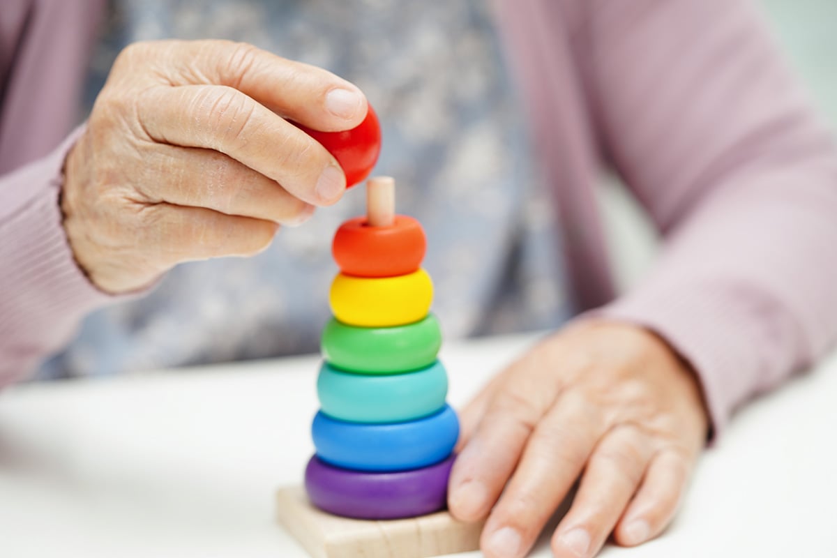 bigstock-Asian-Elderly-Woman-Playing-Pu-478518725 (1)