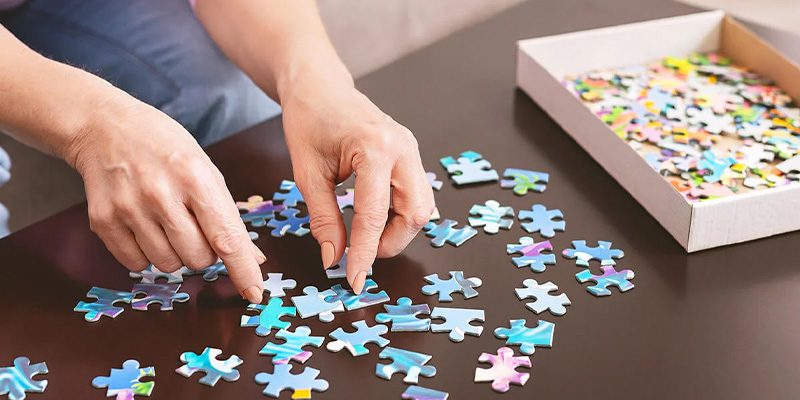 Puzzle and hands