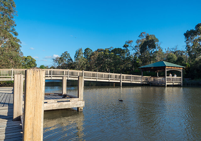 bigstock-Wooden-Causeway-Crossing-Ringw-300482926